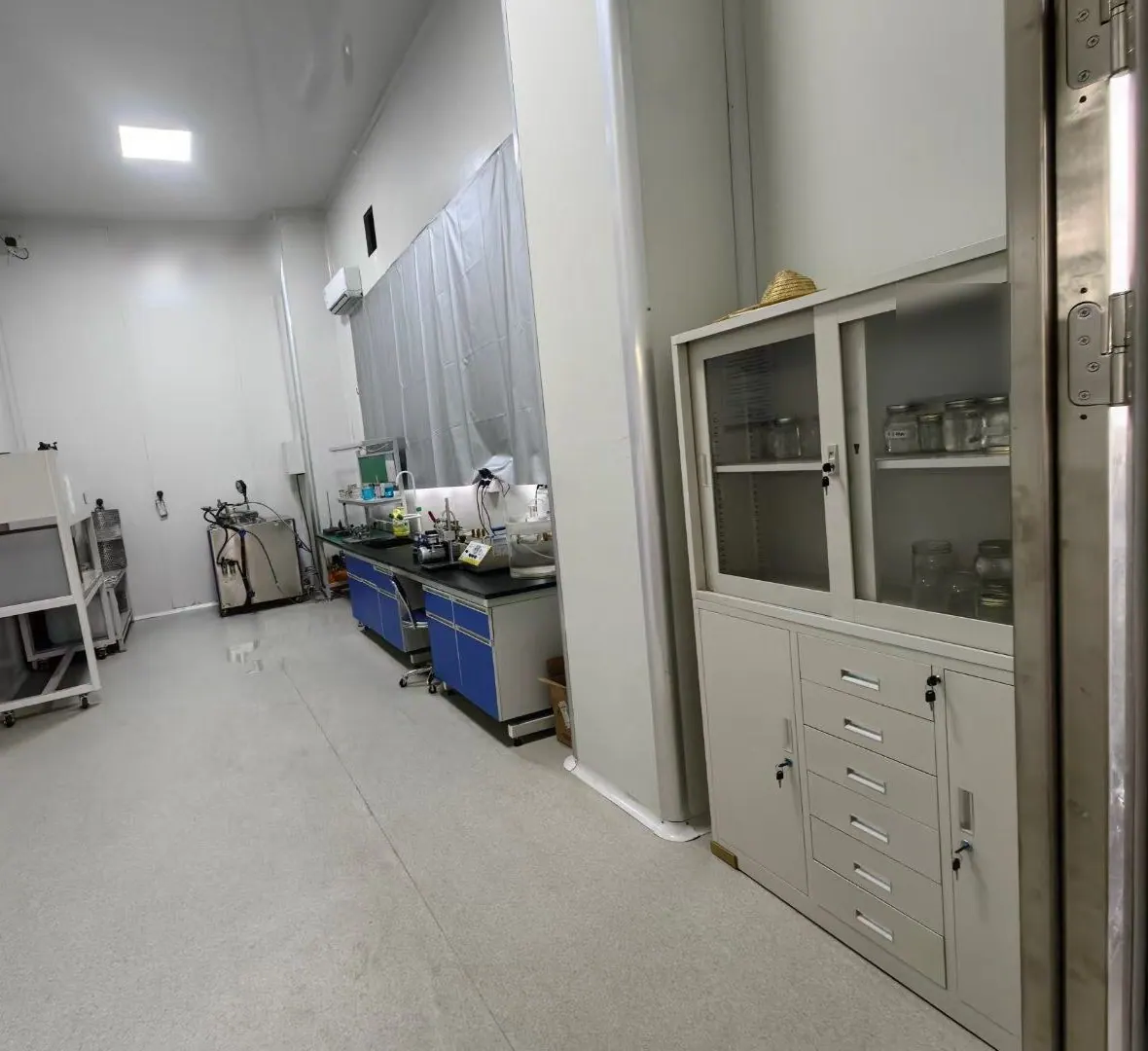 A quality-control laboratory with test benches and cabinets